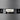 Detaljbild av Aduro-logotyp och reglage på Aduro 9.8 kamin.