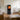 Aduro 9.8 Lux installerad i modernt vardagsrum med stor insyn till elden.